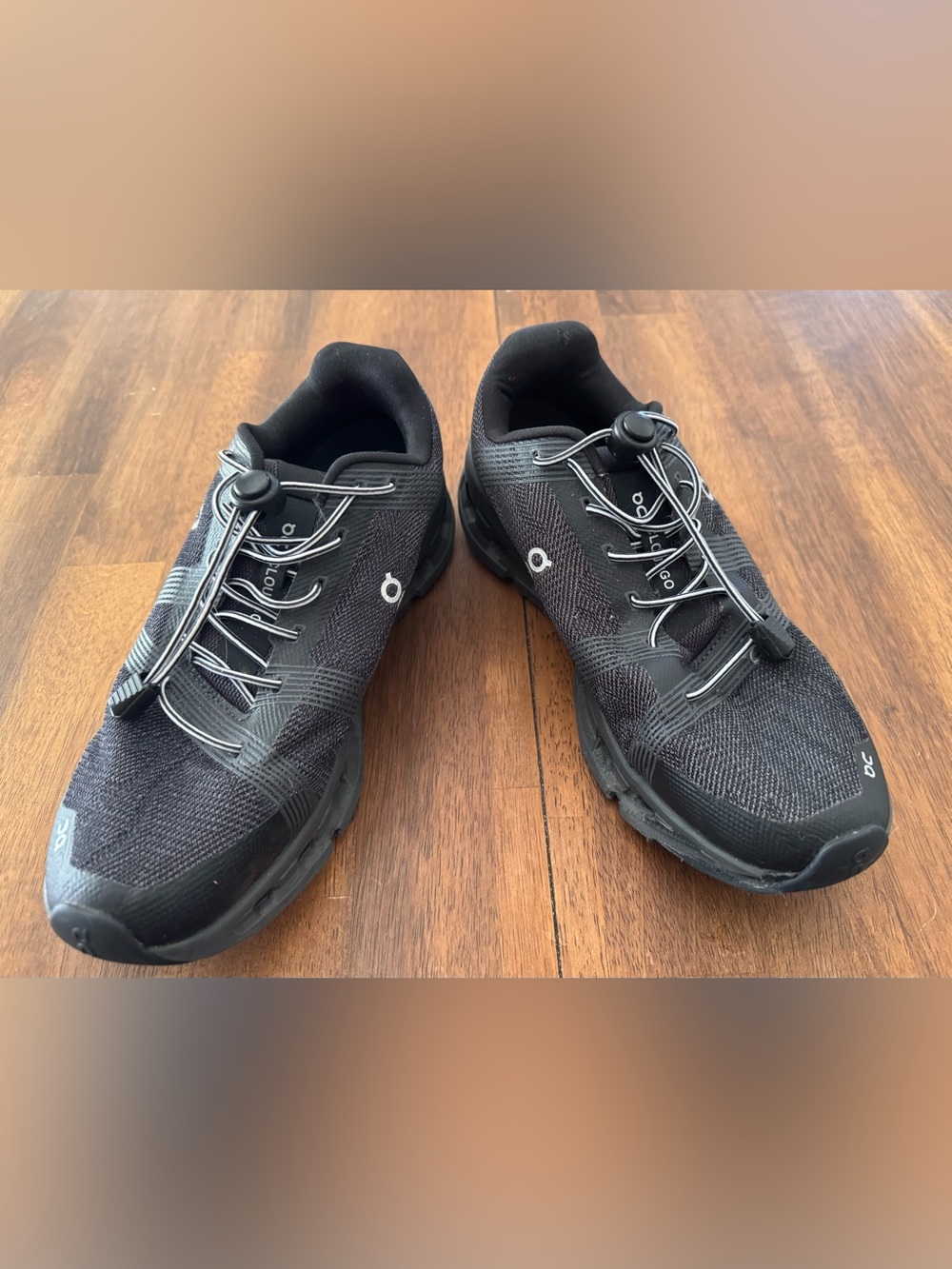 ON Cloudgo, Black/Eclipse Women’s Trainers with Quick-Lace System